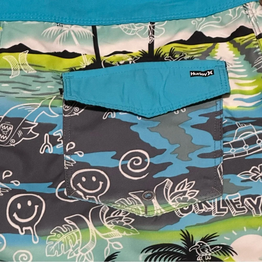 Hurley blue lazer tropical board shorts Swim trunks size 20 /30